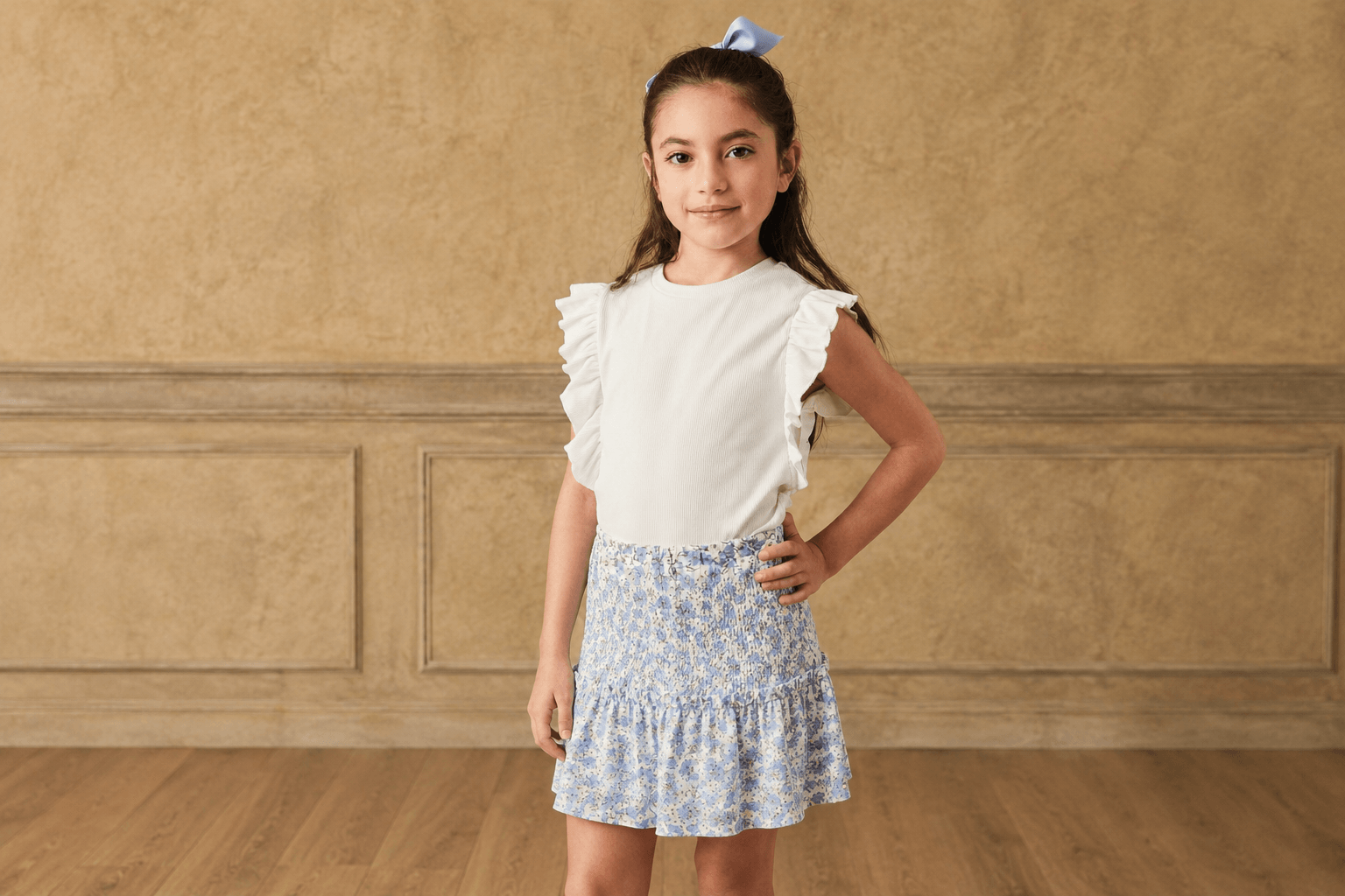 Child model wearing knitwear